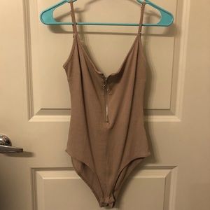 Tan body suite never worn
